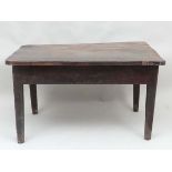 A mid 19thC farmhouse elm topped kitchen table , the table having a thick rounded edge elm top on