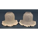 Glass : a pair frilled edge frosted glass light shades, circa , 4 1/4" high and 6" diameter.