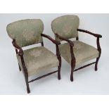 A pair of c.1900 open arm upholstered chairs with carved supports legs etc 24" high CONDITION: