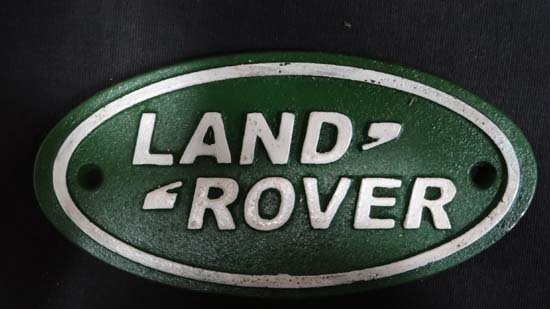 Cast sign " Land rover" CONDITION: Please Note -  we do not make reference to the condition of