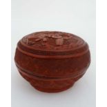 A papier-mache and cinnabar lacquer lidded circular box 4 1/2" diameter  CONDITION: Please Note -