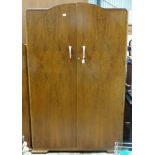 A double walnut wardrobe by Four Shields Furniture CONDITION: Please Note -  we do not make