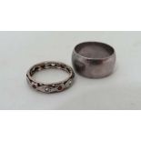 A HM silver ring bearing hallmarks for Birmingham 1978 maker P & R B together with a white and