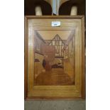 A Rowley style Arts and Crafts carved parquetry panel depicting a courtyard 14 1/2" x 10 3/8"