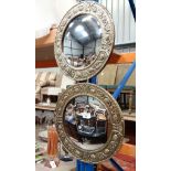 Pair of embossed brass framed convex mirrors CONDITION: Please Note -  we do not make reference to