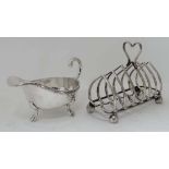 Silver plated toast rack together with a silver sauce boat (2) CONDITION: Please Note -  we do not