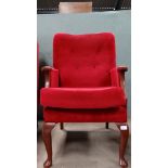 Red armchair CONDITION: Please Note -  we do not make reference to the condition of lots within