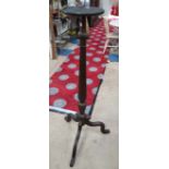A 19thC mahogany tripod torchiere stand with reeded column 51" high  CONDITION: Please Note -  we do