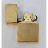 Zippo : an unused Zippo brass cased lighter together with a boxed Zippo Leather lighter pouch