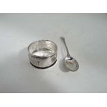 A coffee spoon together with a silver napkin ring (2) CONDITION: Please Note -  we do not make