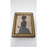 A Victorian cut and highlighted silhouette of a lady 4" x 2 7/8" 

 CONDITION: Please Note -  we