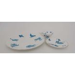 A group of three Blue and white ceramics with over painted transfer decoration depicting flowers,