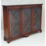 A Contemporary mahogany glazed fronted floor standing triple bookcase 11 1/2" deep x 59 1/2" wide