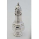 A silver plate sugar caster of octagonal baluster form by Walker & Hall . Approx 6 1/2" high