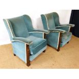 A pair of c.1920 upholstered oak armchairs both with wing style back and overstuffed arms etc. 25