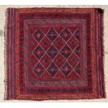 Rug / Carpet : A Turkish hand made woollen Rug with mainly claret red central ground, , having