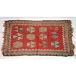 Carpet / rug : a handmade Kilim rug with light blue, orange/ yellow, red, brown and mustard etc