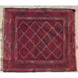 Rug / Carpet : A Turkish hand made woollen Rug with diamond shapes to the central claret red central