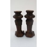 A pair of carved walnut  lions paw feet with lotus flower detail. 8 1/2"  high  CONDITION: Please