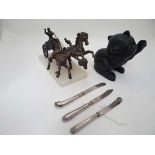 Qty items to include Roman Chariot figure, Iron Black cat, 3 silver handled knives CONDITION: Please