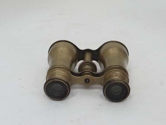 Binoculars  CONDITION: Please Note -  we do not make reference to the condition of lots within