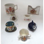 Assorted items comprising matchstriker, crested ware , 1911 commemorative mug and Queen Victoria