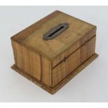 A Victorian olive wood money box of oblong form and money slot to top, 4 1/4 x 3 3/8 x 2 1/4" high