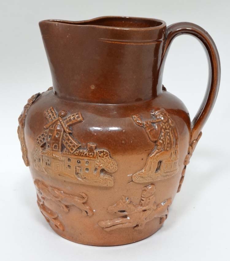 Stoneware jug CONDITION: Please Note -  we do not make reference to the condition of lots within
