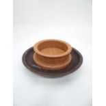 A wooden coaster and wooden bowl (2) CONDITION: Please Note -  we do not make reference to the