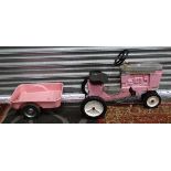 Pink Childs Tractor CONDITION: Please Note -  we do not make reference to the condition of lots