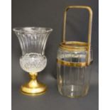 A cut glass vase of stylised thistle form on a gilt base together with a glass biscuit barrel with