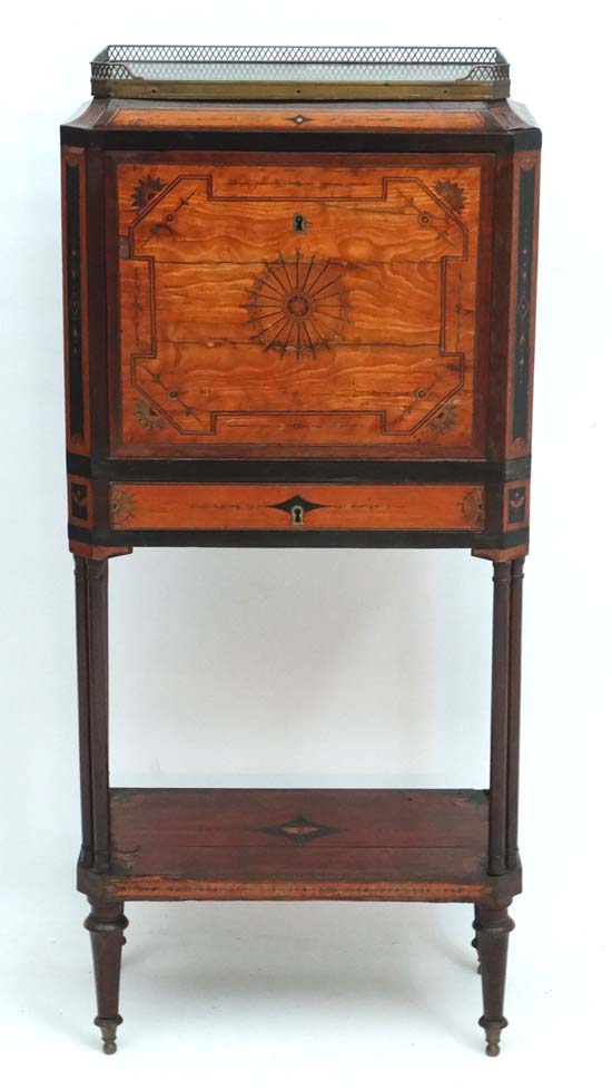 An 18thC Satinwood and mahogany Escritoire ith inlaid inset and butterfly decoration and having a