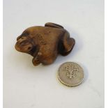 An early 19thC novelty snuff box in the form of a carved wooden frog approx 2 1/4" long