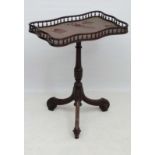 An 18thC Chippendale period serpentine shaped galleried mahogany tripod table 24" wide x 15 1/2"