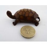 Netsuke : A carved wooden depiction of a tortoise 2 1/4" long  CONDITION: Please Note -  we do not