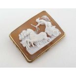 A rectangular brooch set with carved cameo depicting classical figure with horses and chariot,