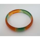 An agate hardstone bangle formed bracelet  CONDITION: Please Note -  we do not make reference to the