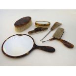 6 assorted faux tortoiseshell dressing table items to includes brushes, mirrors, button, pulls , etc