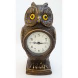 Novelty bronze Clock : an eared owl formed bronze clock ( timepiece) with bevelled circular glass