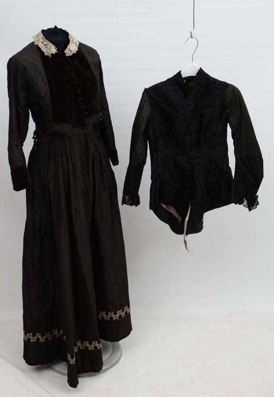 A Ladies black silk, lace and velvet Victorian mourning skirt and jacket together with another black