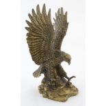 A 20thC cast brass figure of an eagle 10 1/4" high  CONDITION: Please Note -  we do not make