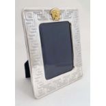 An Italian silver photograph frame ' Gianni Versace ' 10 1/2" high  CONDITION: Please Note -  we
