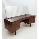Vintage Retro : a British 1960's teak large dressing table , having a central draw flanked by 2 sets
