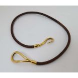 Hermes : A leather double bracelet / necklet with gilt metal hook clasp marked 'Hermes' approx 14