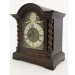 Jungans 3 train Westminster Mantle clock : an oak cased musical clock with barleytwist side columns,
