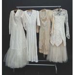 4 Lace wedding dresses
Emenson long sleeve guipure lace and net wedding dress circa 1950's
Crochet