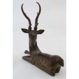 A 20thC hollow cast brass sculpture of an Indian stag 8 1/2" high x 8 3/4" long  CONDITION: Please