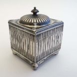 An early 20thC silver plate caddy of squared form with hinged lid. Approx 4" high  CONDITION: Please