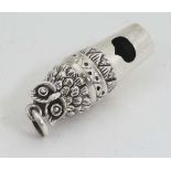A white metal novelty whistle formed as the head of  an owl . Marked .925. 1  1/2" long