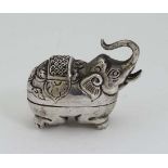 A white metal pill box / container formed as an elephant. Indistinctly marked under. Possibly Indian